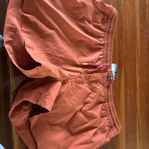 Great pair of Cotopaxi women’s XL shorts in burnt orange